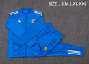 CONJUNTO SUDADERA + PANTS REAL MADRID ENTRENAMIENTO AZUL BLANCO 25/26 HOMBRE