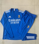 CONJUNTO SUDADERA + PANTS REAL MADRID AZUL BLANCO 25/26 INFANTIL MEDIO CIERRE